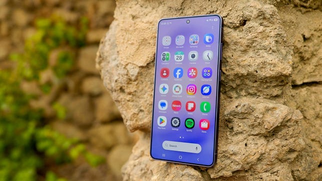 The Samsung Galaxy S26 Ultra is perched on a rock formation