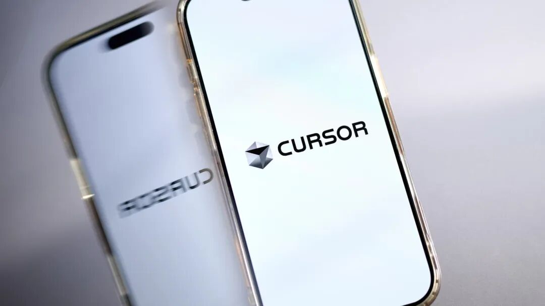 The Cursor logo arranged on a smartphone in New Hyde Park, New York, US, on Thursday, Nov. 20, 2025. Cursor, an artificial intelligence coding startup, has raised $2.3 billion in funding at a $29.3 billion valuation, roughly tripling its value in a matter of months. Photographer: Gabby Jones/Bloomberg via Getty Images