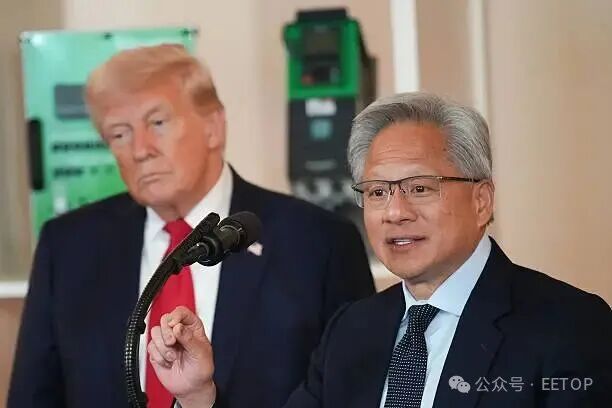 President Donald Trump listens as Nvidia CEO Jensen Huang speaks in the Cross Hall of the White House during an event on "Investing in America" on...