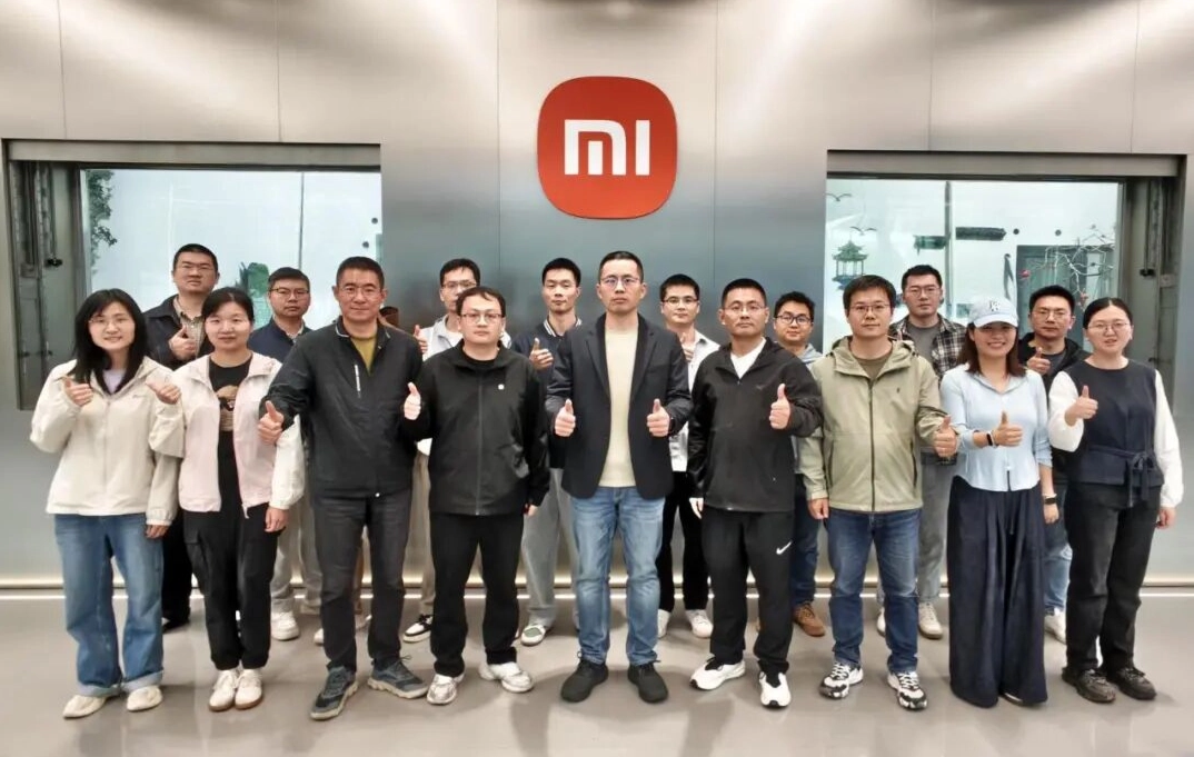 新华社财经报道小米空调节能技术团队:用 AI 破解行业痛点,实现舒适与节能双赢 图片 2