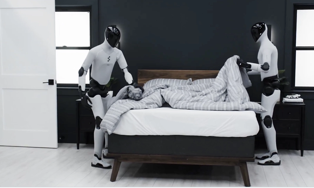 两台 Figure AI 人形机器人大秀新技能:不到两分钟铺好一张床