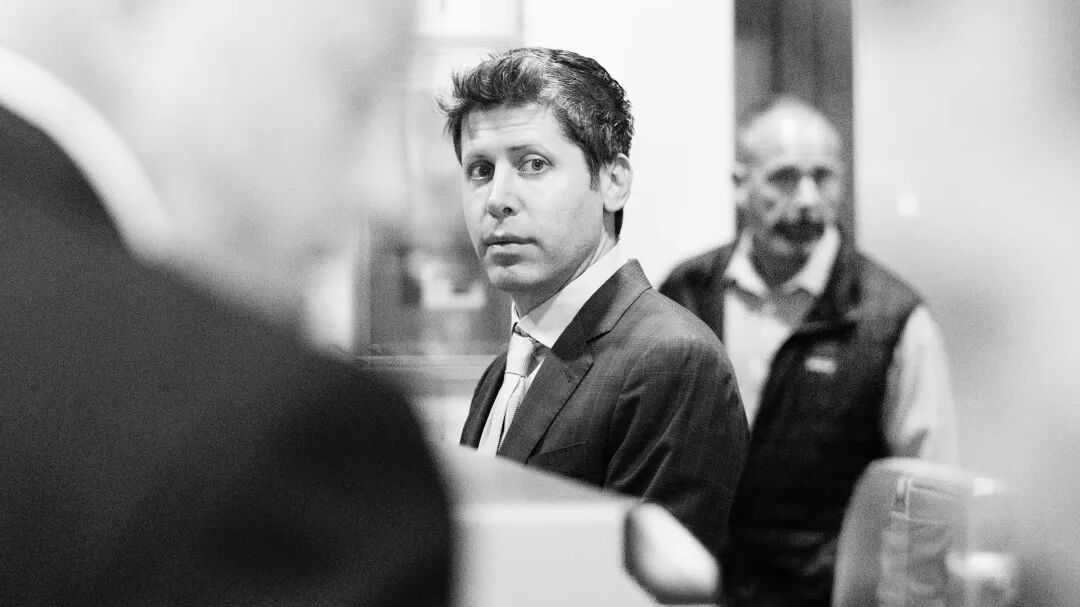 Sam Altman passing through security at the courthouse