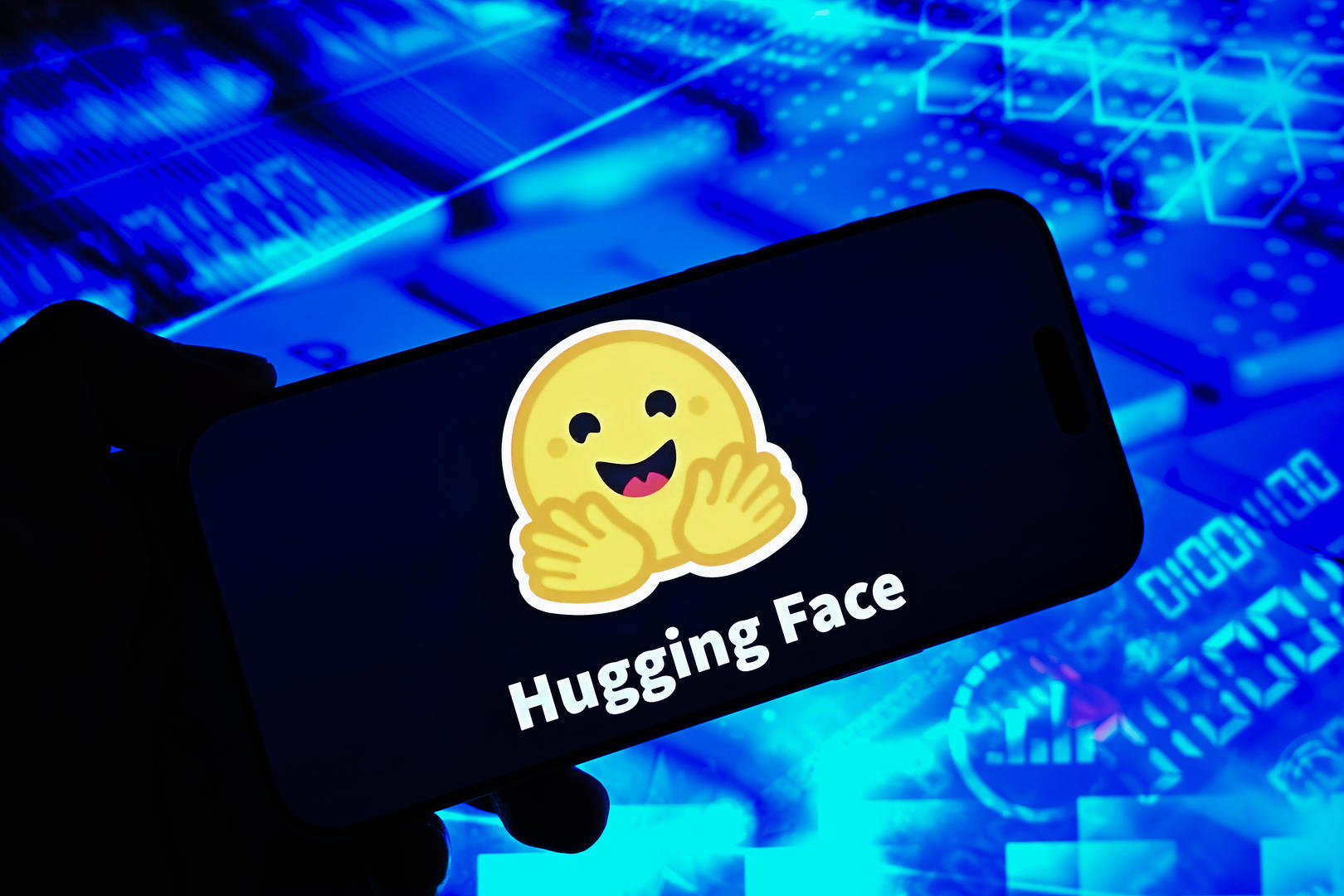 ▲Hugging Face（抱抱脸）标识 据视觉中国