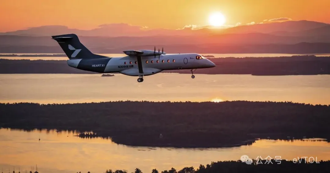 Heart X1 flying over lake at sunset